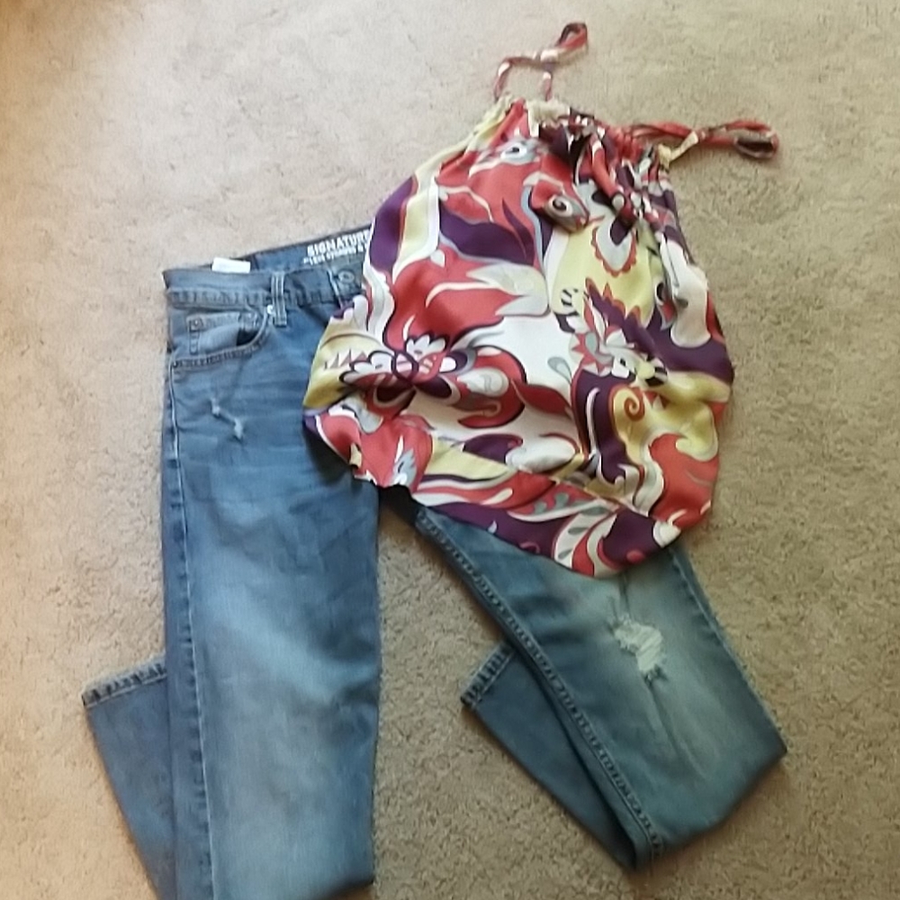 Levi jeans and top.